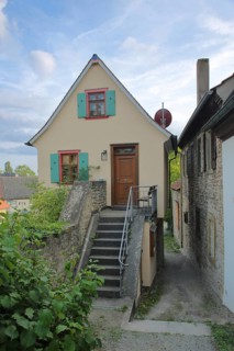 Narrow half-timbered house on the historic town wall
