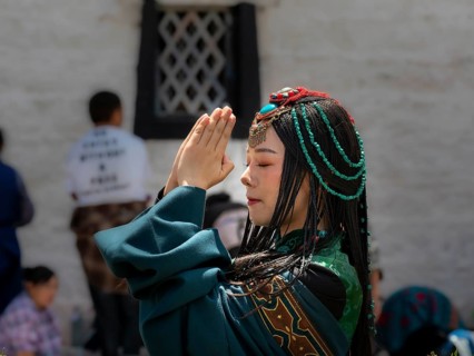 Tibetan young woman with festival clothes