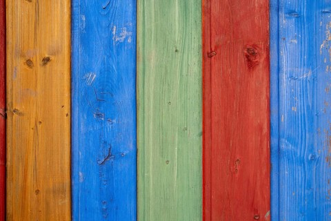 Shuttering made of coloured wooden boards as background or texture