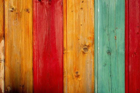 Shuttering made of coloured wooden boards as background or texture