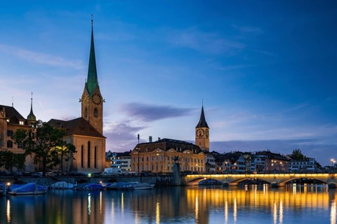 Fraumünster and St. Peter's Church at dusk