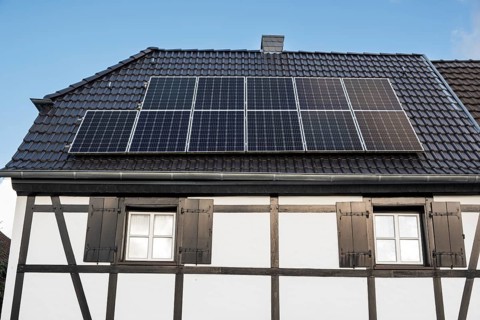 Solar panel on a roof of a half-timbered house in Düsseldorf