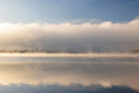 Fog over Lake Constance on an autumn morning with boats