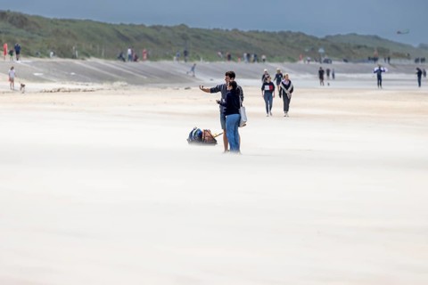 Sand kicked up during storm on the North Sea coast in De Panne