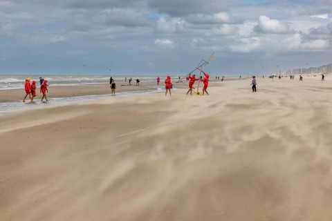 Sand kicked up during storm on the North Sea coast in De Panne