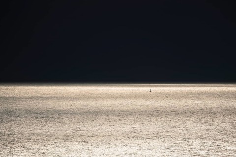 Dark clouds and sunlight over the North Sea