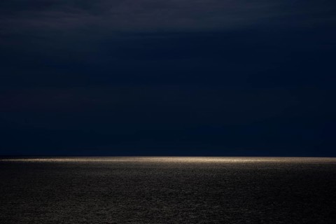 Dark clouds and sunlight over the North Sea