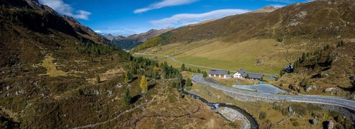 Colourful larches and mountain panorama