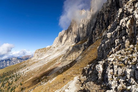 Wisps of clouds drift over the peaks
