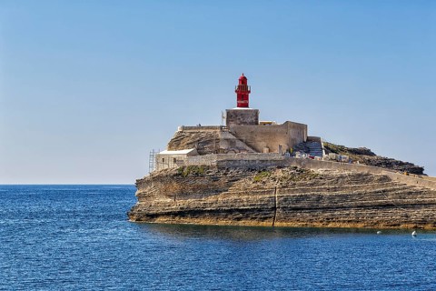 La Madonetta lighthouse on rocky cliff