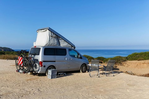 Campervan on car park by the sea