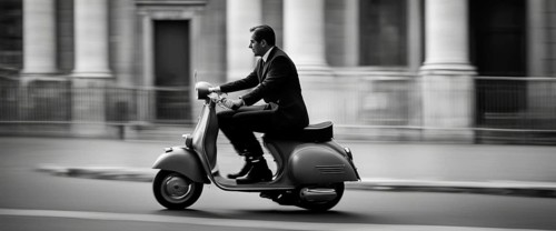 Italian elegant man wearing suit and tie driving vespa moped vintage scooter in Rome Italy at sunset traditional urban scene