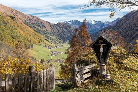 Cross in front of hut fence