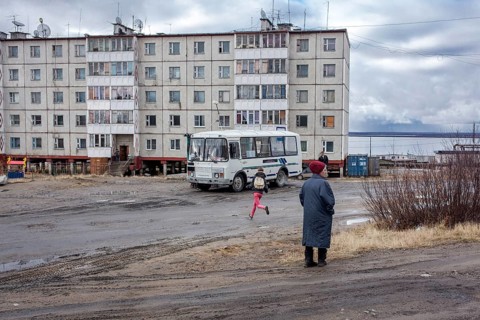 School bus stops in a housing estate