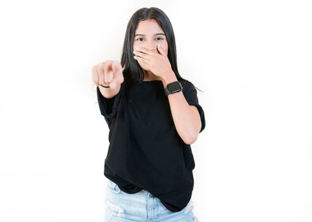 Girl laughing at you pointing at the camera
