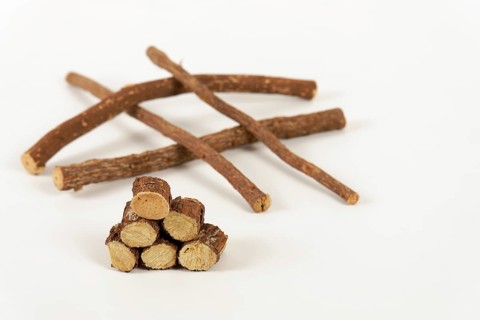 Group of sliced natural licorice roots isolated on a white background