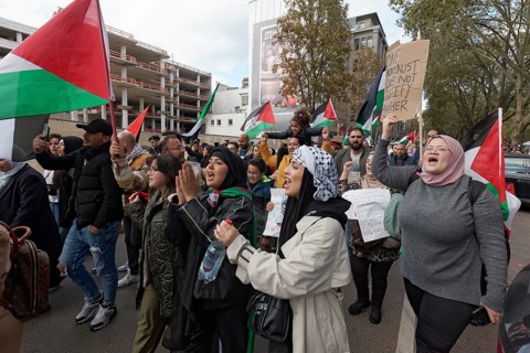 Demo participants at the pro-Palestinian rally to condemn the war crimes against the civilian population in Gaza on 21.10.2023 in Düsseldorf