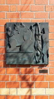 Bronze plaque on the house of the former Verein christlicher Junger Männer