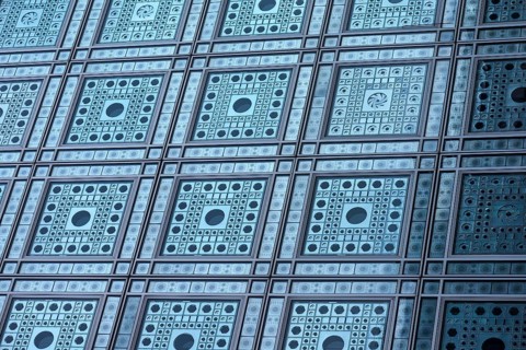 Detail of the decorative glass façade of the Arab World Institute