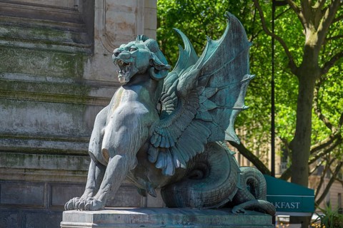 Fantasy figure at the Saint Michael Fountain by architect Gabriel Davioud
