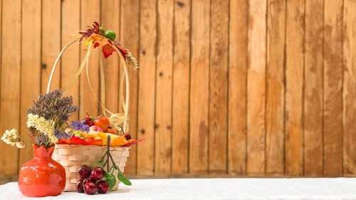 Basket with fruits flowers