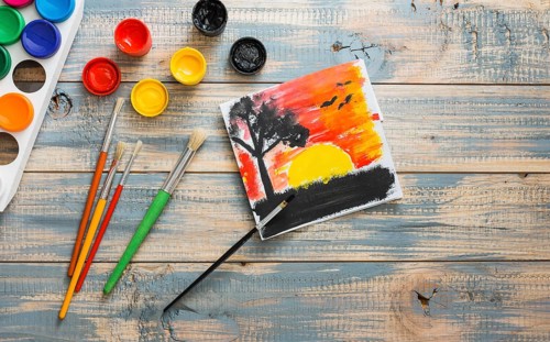 Beautiful nature painting with watercolor container paint brush