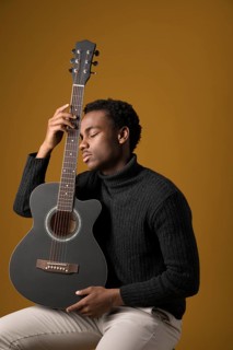 Black boy playing guitar 3