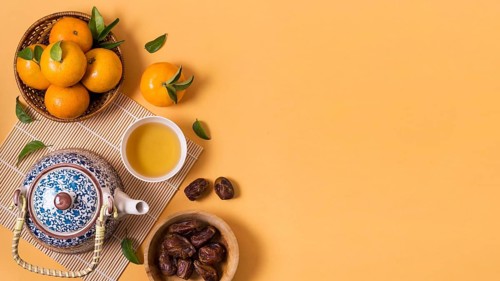 Chinese new year with tea pot mandarines