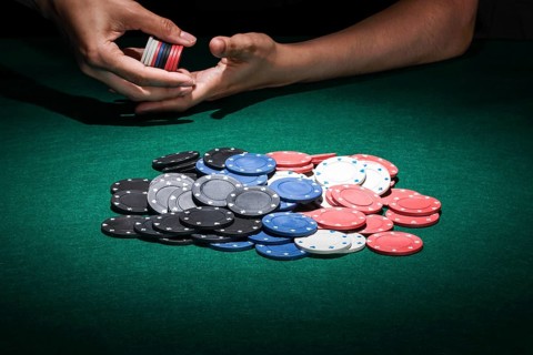 Different poker chips casino table