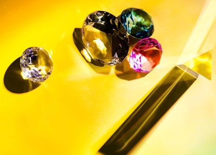 Different types diamonds yellow background