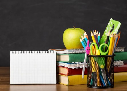 Education day arrangement table with notepad