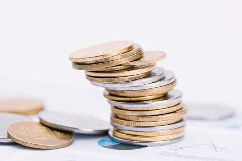 Fallen stack coins white background graph