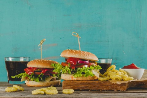 Fast food menu with tasty onion rings