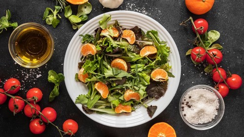 Flat lay food ingredients with salad plate
