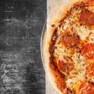 Flat lay pepperoni pizza tray