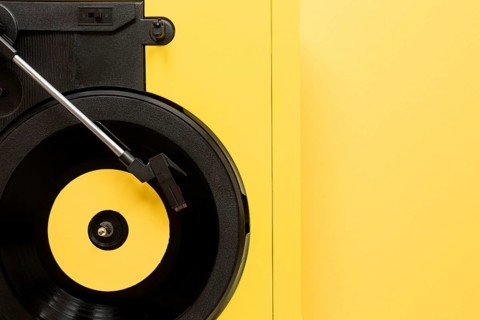 Flat lay vinyl yellow background
