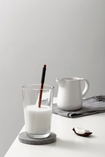 Front view glass milk with coconut