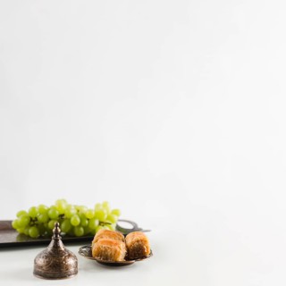 Green grape tray near baklava