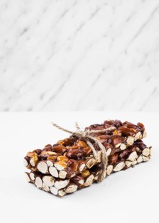 Healthy dried fruits tied with string white background