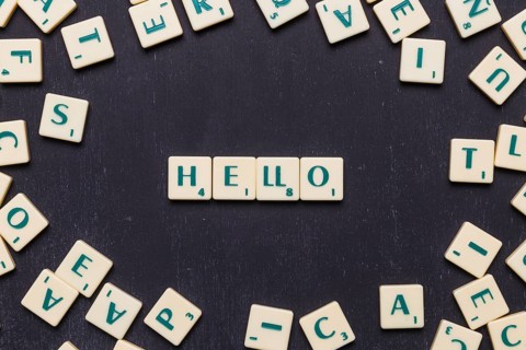 Hello text made from scrabble game letters
