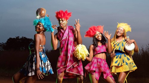 Low angle group friends dressed carnival