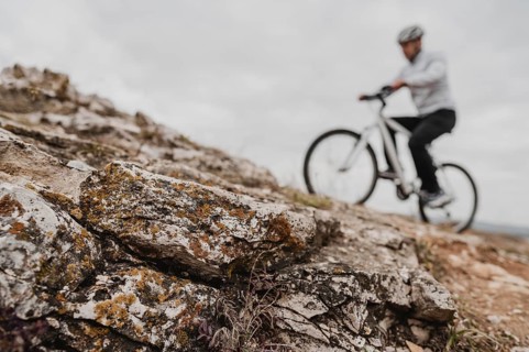 Man riding mountain bike safety equipment
