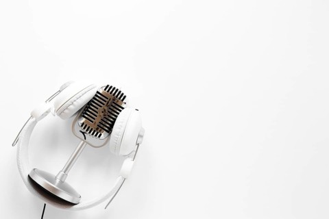 Microphone with headphones copy space