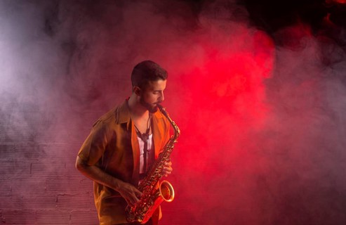 Musician fog playing saxophone
