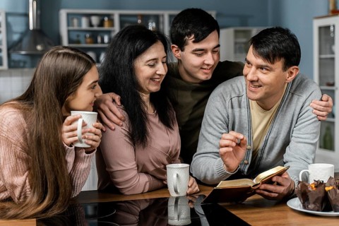 People reading from bible kitchen