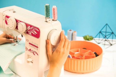 Sewing machine with blue background