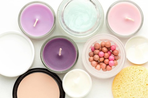 Top view collection cosmetic products candles