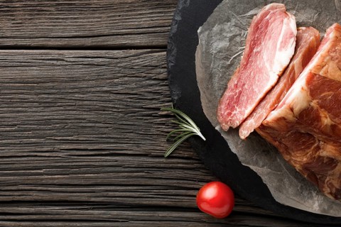 Top view delicious pork meat table