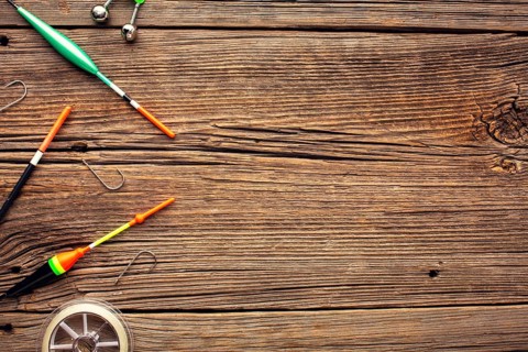 Top view fishing essentials with copy space hooks
