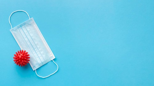 Top view medical mask with virus copy space
